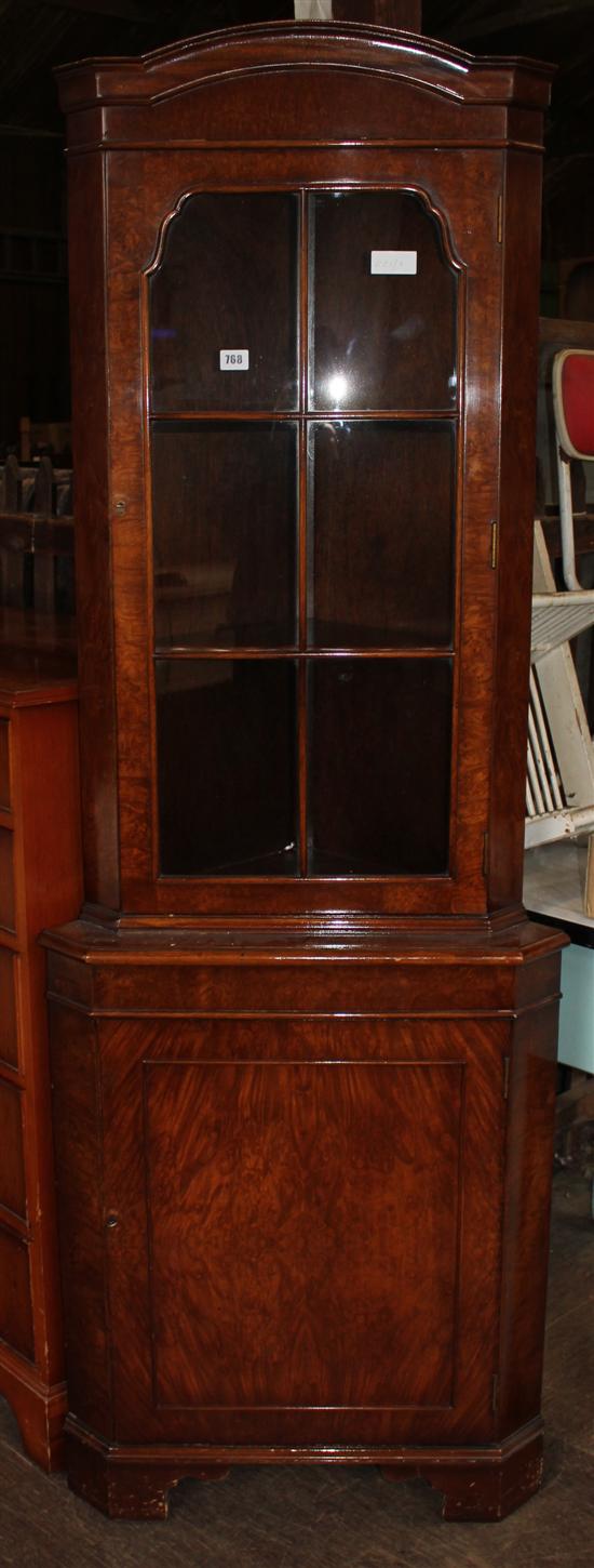Walnut glazed standing corner cabinet(-)